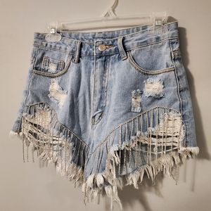 Denim cutoffs with rhinestone fringe